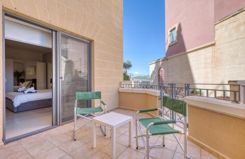 Għadira Apartment | Beachfront Apt with Pool Access