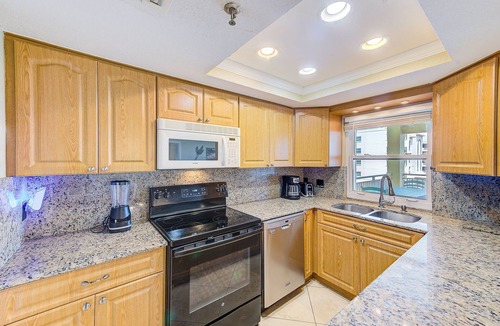 Redington Shores Apartment | Beachfront! Balcony, Sleeps 10 & King Bed, Heated Pool -308