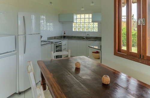 Barra de Ibiraquera House | Beachfront house with spectacular views and a large garden.