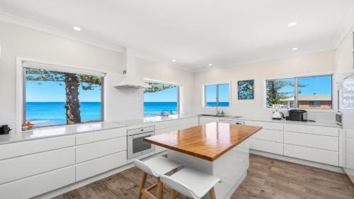 The Entrance House | 'Beachfront Breeze - Family Getaway' by HolidayCo