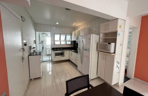 Gonzaga Apartment | Beachfront building on Gonzaga beach with designated parking space.