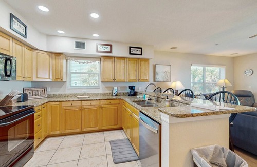 Independence Square Condo | Beachfront corner condo with pool and hot tub easy access to dining
