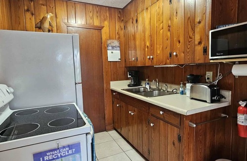 Independence Square Cottage | Beachfront Cottages GARDEN at Beautiful Sandy Shores on Gulf of America