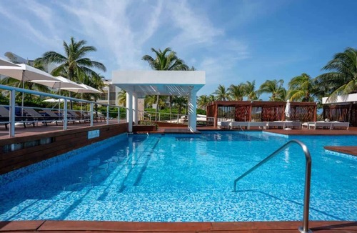 Playa Mujeres Apartment | Beachfront Condo | 3BR | Pool & Premium Amenities