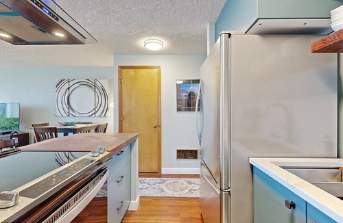 Rockaway Beach Condo | Beachfront condo boasting beautiful views a private balcony and perfect location