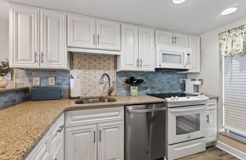 Northeast Virginia Beach Apartment | Beachfront Condo/Pool/Surfing/Fishing/Surf