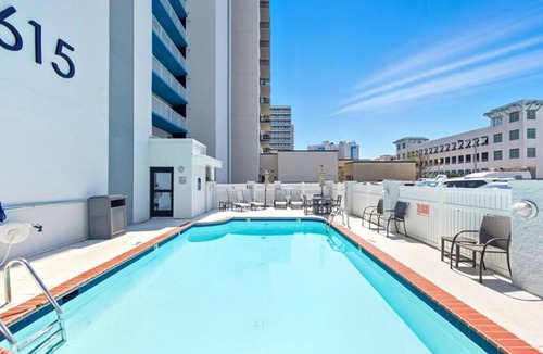 Northeast Virginia Beach Apartment | Beachfront Condo/Pool/Surfing/Fishing/Surf