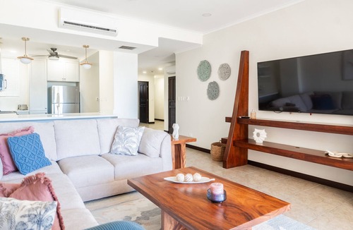 Barrio Los Villalobos Apartment | Beachfront Condo with Resort Pools and Gardens, and Ocean-View Balcony
