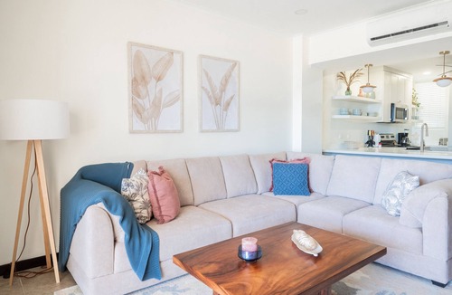 Barrio Los Villalobos Apartment | Beachfront Condo with Resort Pools and Gardens, and Ocean-View Balcony