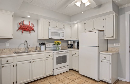 South Nags Head Condo | Beachfront Condo with Private Patio and 2 Pools