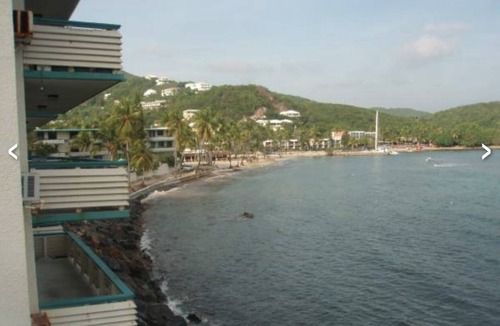 Estate Bolongo Apartment | Beachfront Condominium + bar/restaurant on-site: LeBlu