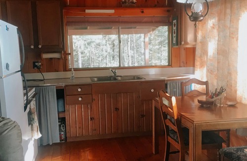 Millinocket Cabin | Beachfront Cottage on Ambajejus Lake With Sandy Beach and a Mountain View