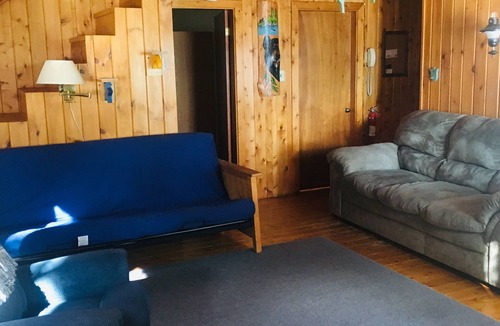 Millinocket Cabin | Beachfront Cottage on Ambajejus Lake With Sandy Beach and a Mountain View