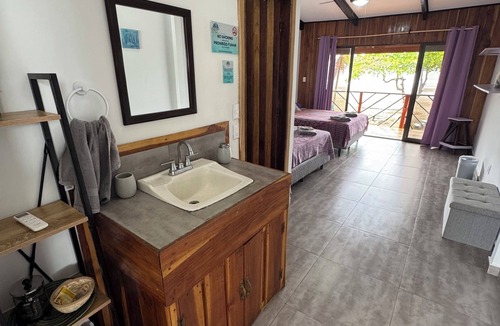 Esterillos Centro Hotel | Beachfront Escape in Esterillos Centro - Pool, A/C, WiFi & Private Rooms