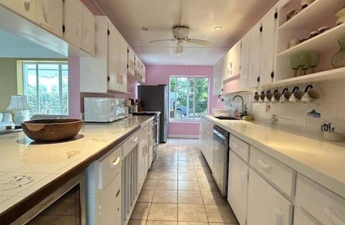 Cades Bay Villa | Beachfront Estate with Pool and Tropical Garden