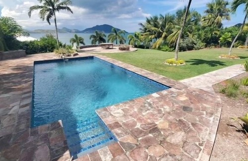 Cades Bay Villa | Beachfront Estate with Pool and Tropical Garden