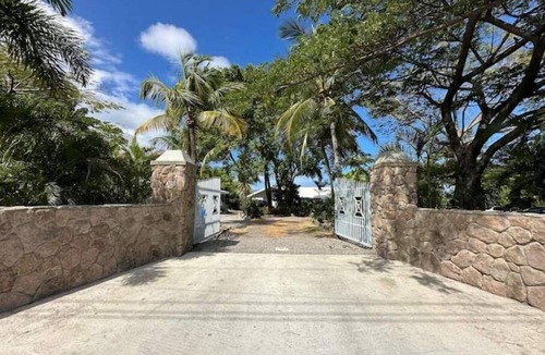 Cades Bay Villa | Beachfront Estate with Pool and Tropical Garden