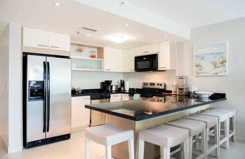 Oranjestad-West Condo | Beachfront - Garden Delight 3BR condo - E125