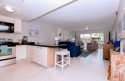 Oranjestad-West Condo | Beachfront - Garden Delight 3BR condo - E125