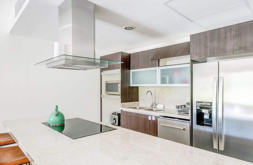Puerto Juarez Condo | Beachfront Getaway: Patio, Pool, BBQ, and Spa
