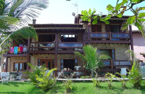Bertioga House | Beachfront house with 5 suites, swimming pool, air conditioning, in a gated community.