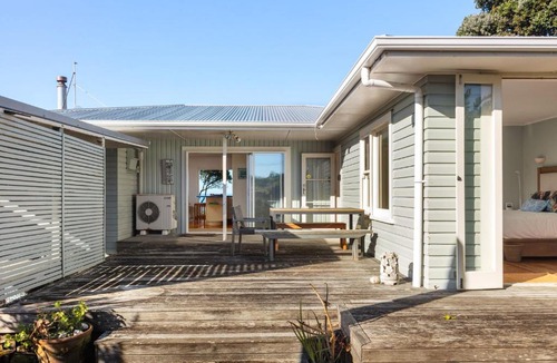 Wainui House | Beachfront Kiwi bach with direct beach access