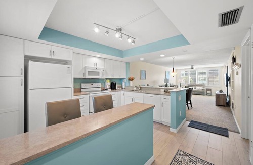 Sanibel Condo | Beachfront Loggerhead Cay 302— comforts of home, Heated Pool, Tennis, Pickleball & Bikes + Beach Gear. Weekly Stays.