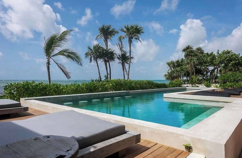 Soliman Bay Apartment | Beachfront Luxury + Rooftop Oasis Tankah Bay