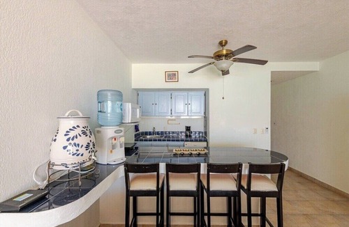 Playacar Condo | Beachfront One Bedroom , Steps to 5th ave and Ferry Terminal, Prime location