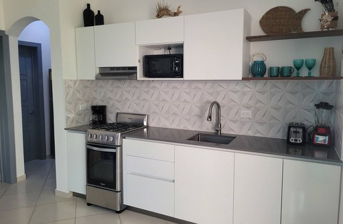 La Iglesia Condo | Beachfront Paradise 1 bedroom condo, 50 meters from Playa Popy, sleeps up to 4