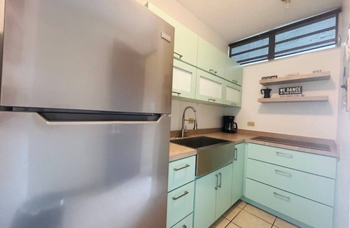 Stella Apartment | Beachfront Petite Paradise unit at Pelican Reef 103