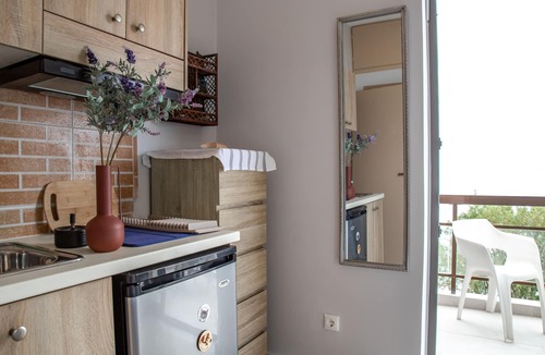 Agia Marina Apartment | Beachfront Room with Balcony Overlooking the Mediterranean Sea
