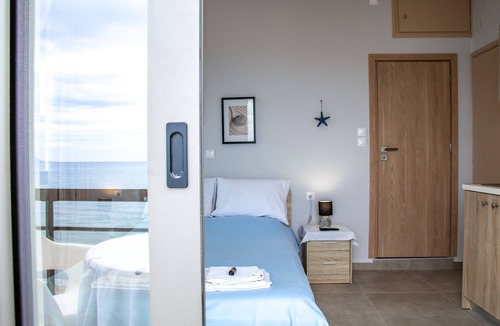 Agia Marina Apartment | Beachfront Room with Balcony Overlooking the Mediterranean Sea