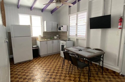 El Combate Cabin | Beachfront Rustic Cabin by Sunset Village - Purple