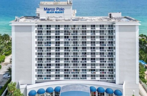 Sunny Isles Beach Condo | Beachfront Studio with Balcony, Gym, Sauna & Parking at Marco Polo Beach Resort”