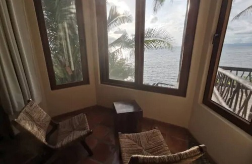 South Shore Hotel Area House | Beachfront Steps from Romantic Zone: Casa Cuatro Abrazos (Lower Half)