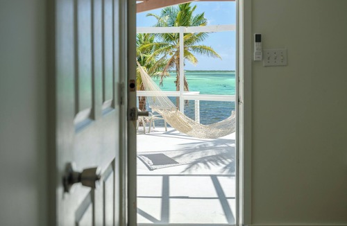 Blossom Village Cottage | Beachfront Villa with amazing views- Private pool/Wifi.