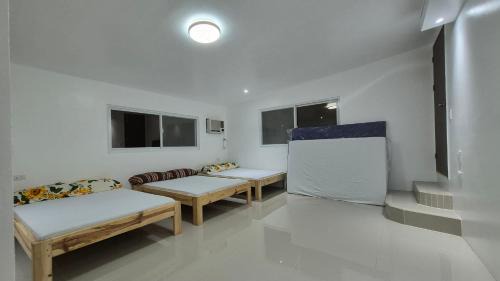 Caba House | Beachfront White House for 10pax
