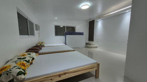 Caba House | Beachfront White House for 10pax