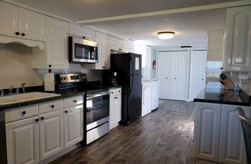 Elk Rapids House | BeachFrontRental-Tennis court&playground directly across the street!DogsWelcome