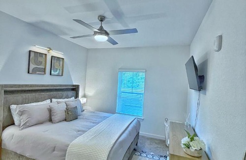 Golden Glades - The Woods Apartment | Beachline Oasis