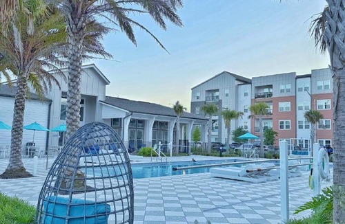 Golden Glades - The Woods Apartment | Beachline Oasis