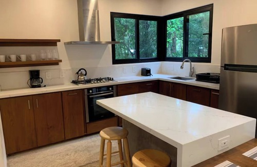 Mal Pais Condo | Beachside 3BR + Private Catamaran Fishing Hosted by Your Stay