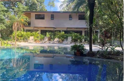 Mal Pais Condo | Beachside 3BR + Private Catamaran Fishing Hosted by Your Stay