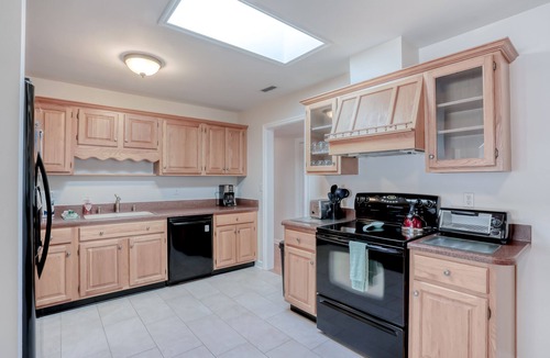 Atlantic Shores House | Beachside snowbird escape with fenced yard & washer/dryer - walk to beach access