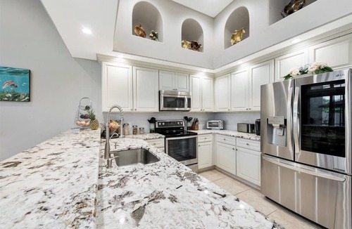 Indian Harbour Beach House | Beachside 5 Bedroom with 2 living rooms, game room & yard game space