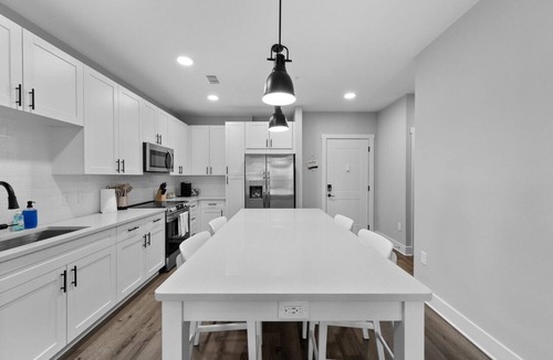 Deerwood Apartment | Beachy Bliss: Elegant 2BR/2BA with Pool & Gym