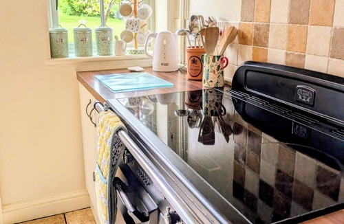 Briston Cottage | BEACONSFIELD COTTAGE, pet friendly, with a garden in Briston