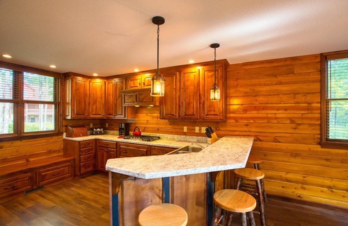 McHenry House | Bear on Mountain offers an exquisite Log Cabin on WISP Mountain