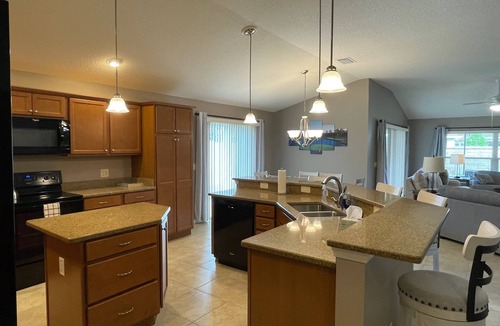 The Villages House | Beautiful 3/2 Villa Walking distance to Brownwood w/BBQ & Golf Cart!